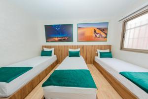 Postel nebo postele na pokoji v ubytování smiley house imsouane