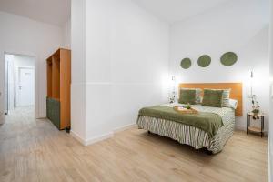 Postel nebo postele na pokoji v ubytování Elegante loft en Almería con zona de trabajo