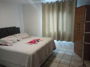 Ένα ή περισσότερα κρεβάτια σε δωμάτιο στο No jardim