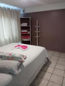 Postel nebo postele na pokoji v ubytování No jardim