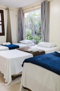 Postel nebo postele na pokoji v ubytování Pousada Boa Vista + 104 fotografií