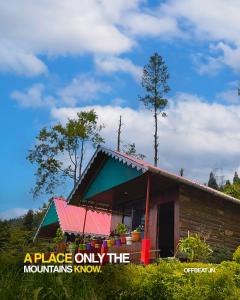 an apartment only the mountains know sign in front of a house at Offbeat Jn in Sukhia Pokhari