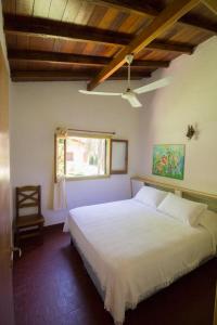 Postel nebo postele na pokoji v ubytování Bungalows Aguas Claras