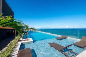 Πισίνα στο ή κοντά στο Prédio à beira-mar c/ Piscina e academia - ARUs