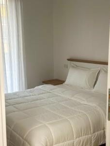 Ένα ή περισσότερα κρεβάτια σε δωμάτιο στο Tirana Luxe Apartments 3