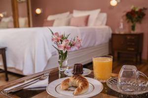 Ένα ή περισσότερα κρεβάτια σε δωμάτιο στο La Noire Petit hotel