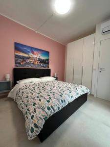 Postel nebo postele na pokoji v ubytování Riflessi su Ibla