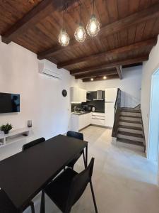 Kuchyň nebo kuchyňský kout v ubytování Riflessi su Ibla