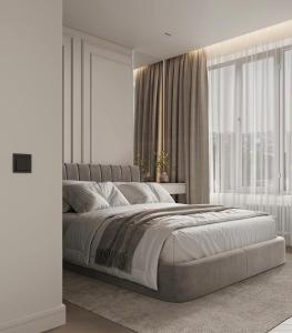 a bedroom with a large bed and a large window at Louise Delux- Free privat parking in Nyíregyháza