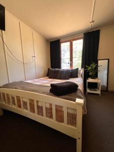 Ένα ή περισσότερα κρεβάτια σε δωμάτιο στο Cosy rural getaway