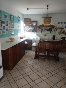 Η κουζίνα ή μικρή κουζίνα στο Villino Ida +25 φωτογραφίες