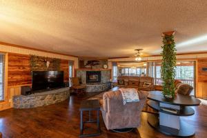 a living room with a couch and a tv at Eagles Rest in Fleetwood