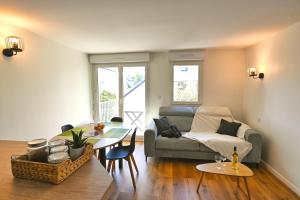 Χώρος καθιστικού στο L'Escapade Bauloise - Cozy - Benoît Beach - Port