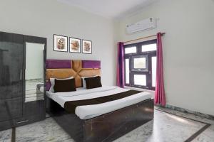 Giường trong phòng chung tại Hotel O KK +20 ảnh