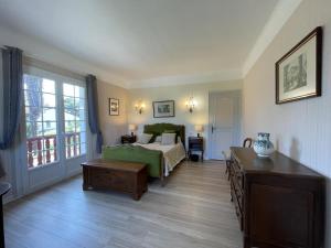 Ένα ή περισσότερα κρεβάτια σε δωμάτιο στο Ateka