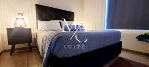 Ένα ή περισσότερα κρεβάτια σε δωμάτιο στο Exclusivo departamento Icono