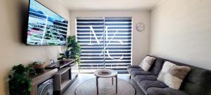 Μια τηλεόραση ή/και κέντρο ψυχαγωγίας στο Exclusivo departamento Icono