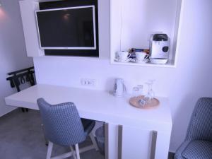 Příslušenství pro přípravu čaje a kávy v ubytování Platia + 24 fotografií