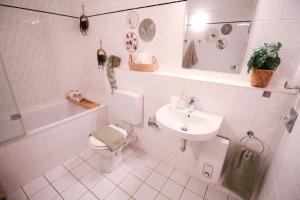 Koupelna v ubytování NOVA See APT 16 I Phantasialand I Cologne I Bonn + 10 fotografií