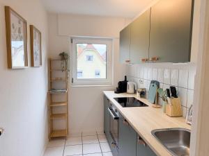 Kuchyň nebo kuchyňský kout v ubytování NOVA See APT 16 I Phantasialand I Cologne I Bonn