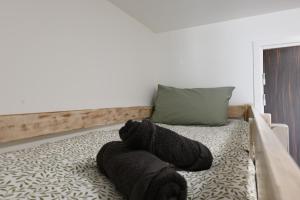 Ένα ή περισσότερα κρεβάτια σε δωμάτιο στο L'Escapade Bauloise - Cozy - Benoît Beach - Port