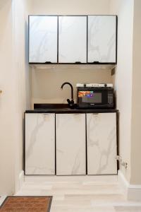 Kuchyň nebo kuchyňský kout v ubytování استديو فاخر في العليا 202