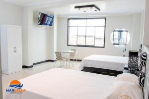 a hospital room with a bed and a window at Descubre un lugar pensado para ti in Sechura