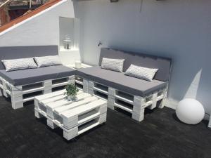 Ein Sitzbereich in der Unterkunft A Terrace on a Topfloor with a View