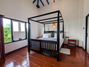 Postel nebo postele na pokoji v ubytování Hela Ayurveda Hotel + 50 fotografií