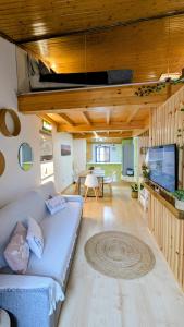 a living room with a couch and a table at Cantiño 39 in Lugo +29 photos