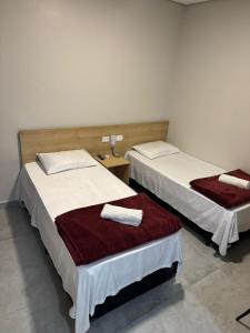 Postel nebo postele na pokoji v ubytování Hotel Novo México