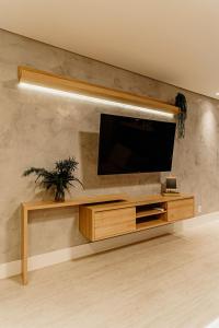 Et tv og/eller underholdning på Elyseés Residencial Flipchave ELY000