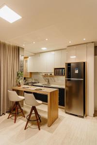 Køkken eller tekøkken på Elyseés Residencial Flipchave ELY000