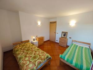 Ένα ή περισσότερα κρεβάτια σε δωμάτιο στο Corte degli Artisti +10 φωτογραφίες