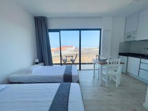 Postel nebo postele na pokoji v ubytování Studio Medsal