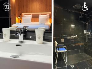 a hotel room with a bed and a sink and a bathroom at CHATEAU R in Wettolsheim +190 photos
