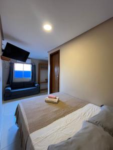 Ένα ή περισσότερα κρεβάτια σε δωμάτιο στο Casinhas da Vila