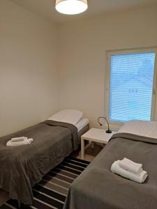 Postel nebo postele na pokoji v ubytování Central and Spacious Apartment for 6 with Sauna