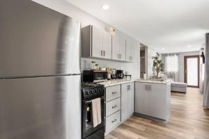 Kuchyň nebo kuchyňský kout v ubytování Vagones del Rio - River Access