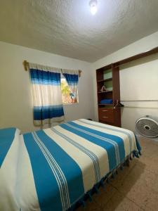 Postel nebo postele na pokoji v ubytování Casa Magro depto 1er piso para 6