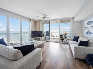 a living room with a view of the ocean at Mermaid Manor in Navarre
