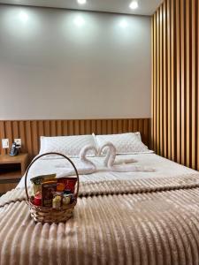 Postel nebo postele na pokoji v ubytování Flat Alto Padrão em Adrianopolis