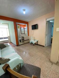 TV a/nebo společenská místnost v ubytování Casa Magro depto 1er piso para 6 + 12 fotografií