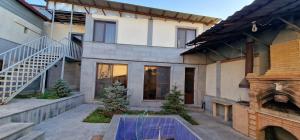 an external view of a house with a courtyard at Zeytoun Guest House in Yerevan