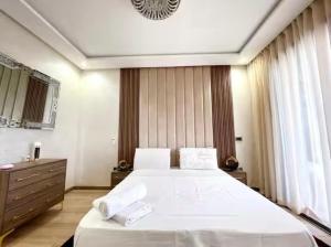 Ένα ή περισσότερα κρεβάτια σε δωμάτιο στο Marco