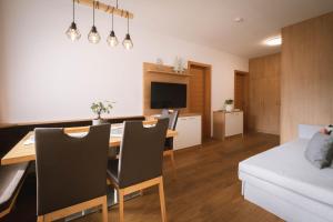 TV a/nebo společenská místnost v ubytování dolomites view apartment