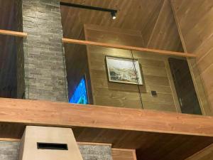 a view of a room with a wooden ceiling at Mountain Cabin With Views Over Jämtland's Expanse in Storhågna