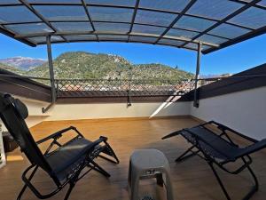 Nespecifikovaný výhled na hory nebo výhled na hory při pohledu z apartmánu