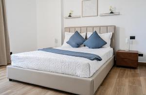 Ένα ή περισσότερα κρεβάτια σε δωμάτιο στο Central Park at Downtown Punta Cana +91 φωτογραφίες