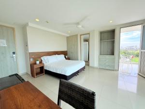 Ένα ή περισσότερα κρεβάτια σε δωμάτιο στο Hotel Summer Frente Al Mar